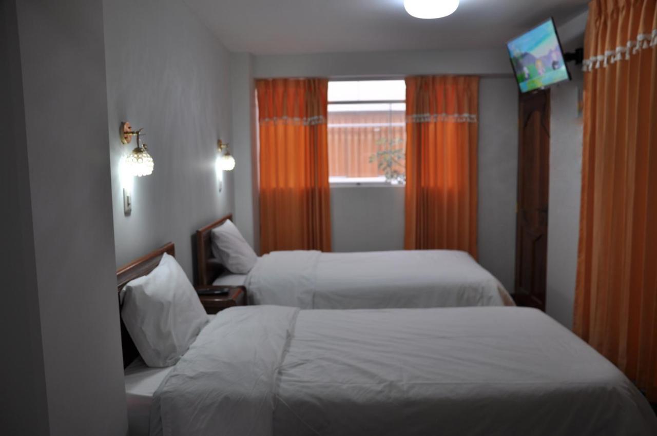 Cesar'S Hotel Peru Puno Exterior photo